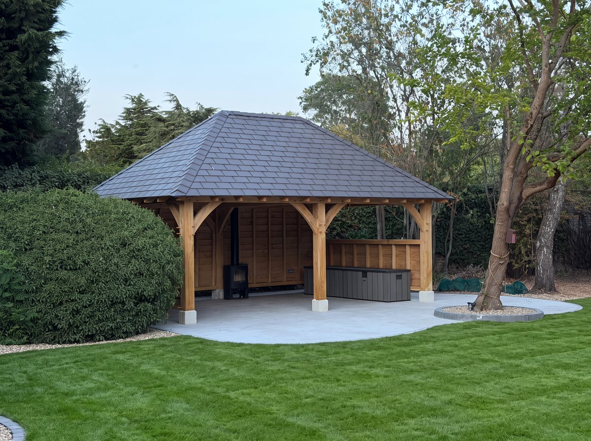 Oak gazebo and porcelain patio built by Arcadia Build in Godmanchester, Cambridgeshire
