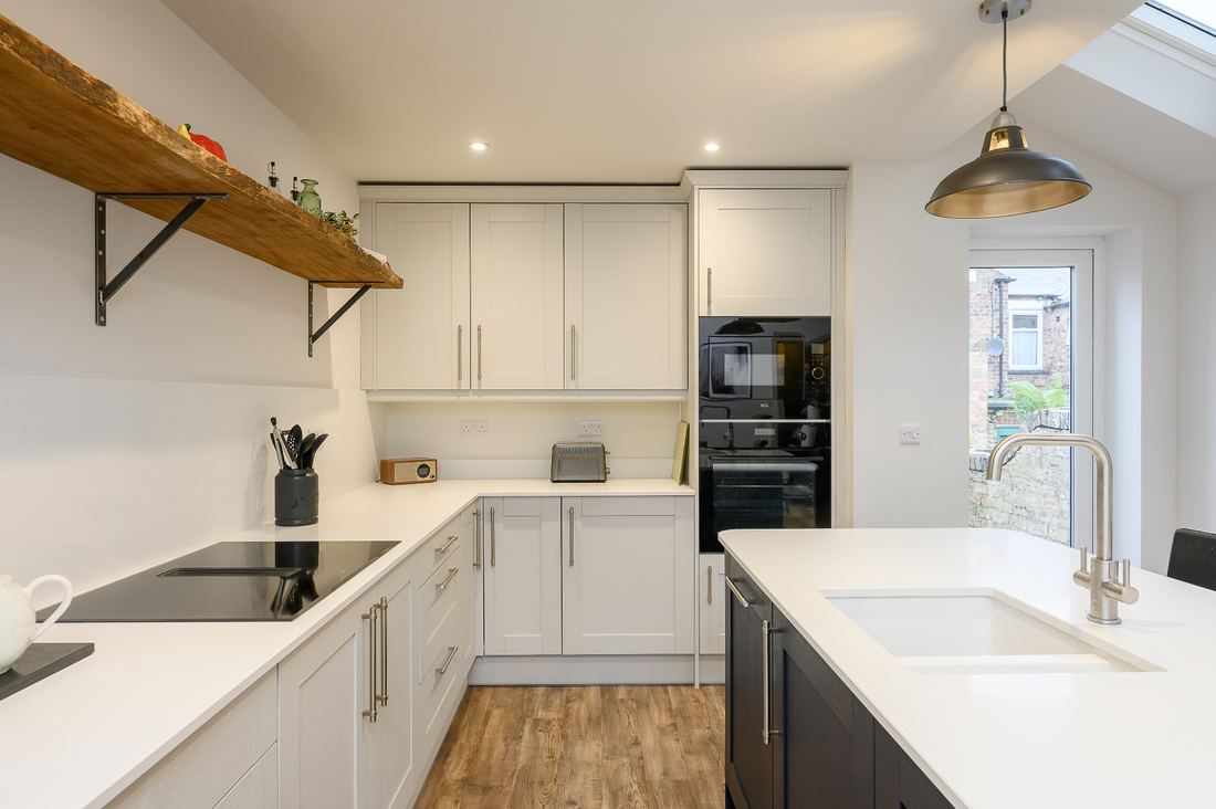 Modern kitchen refurbishment with shaker cabinets and quartz worktops by builder in Cambridgeshire