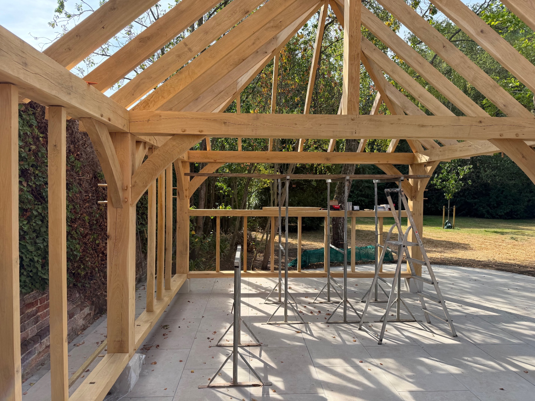 View from inside the oak gazebo looking out across the garden in Godmanchester