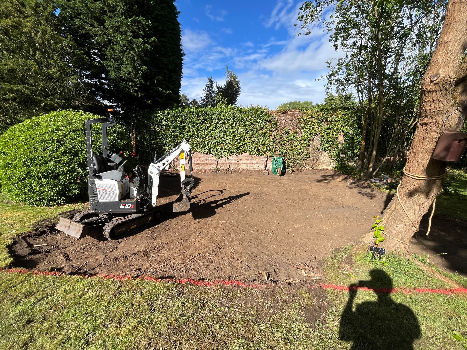 Excavated and levelled patio area ready for sub base in Godmanchester