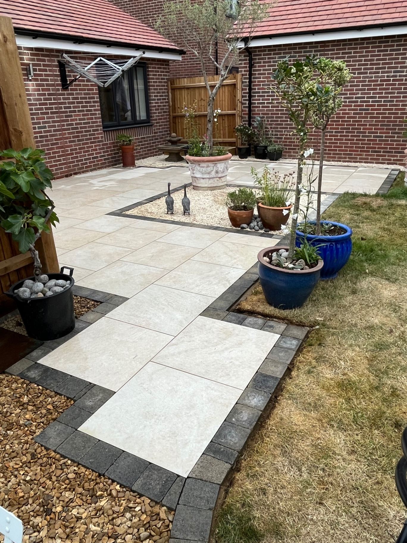 Stilton porcelain patio paving installation in Cambridgeshire by Arcadia Build & Landscape