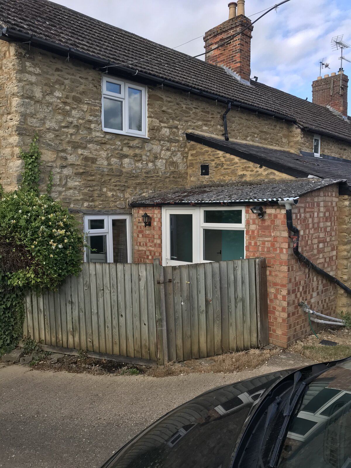 Turvey, Bedfordshire stone cottage front elevation before refurbishment by Arcadia Build & Landscape