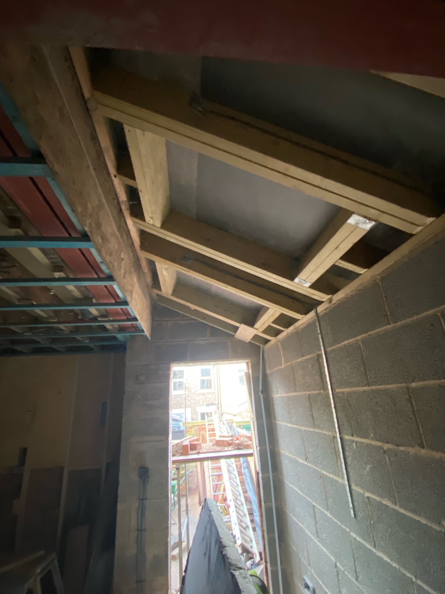 New timber roof structure on Cambridgeshire side extension before slate tiles
