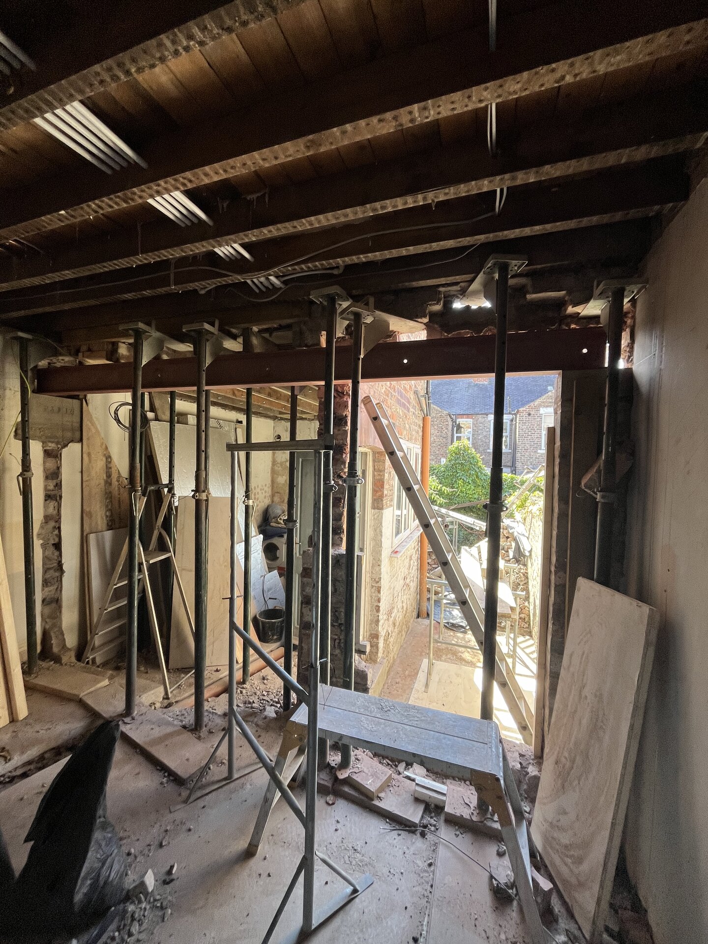 Structural steel beam (RSJ) installed across new opening in Cambridgeshire side extension