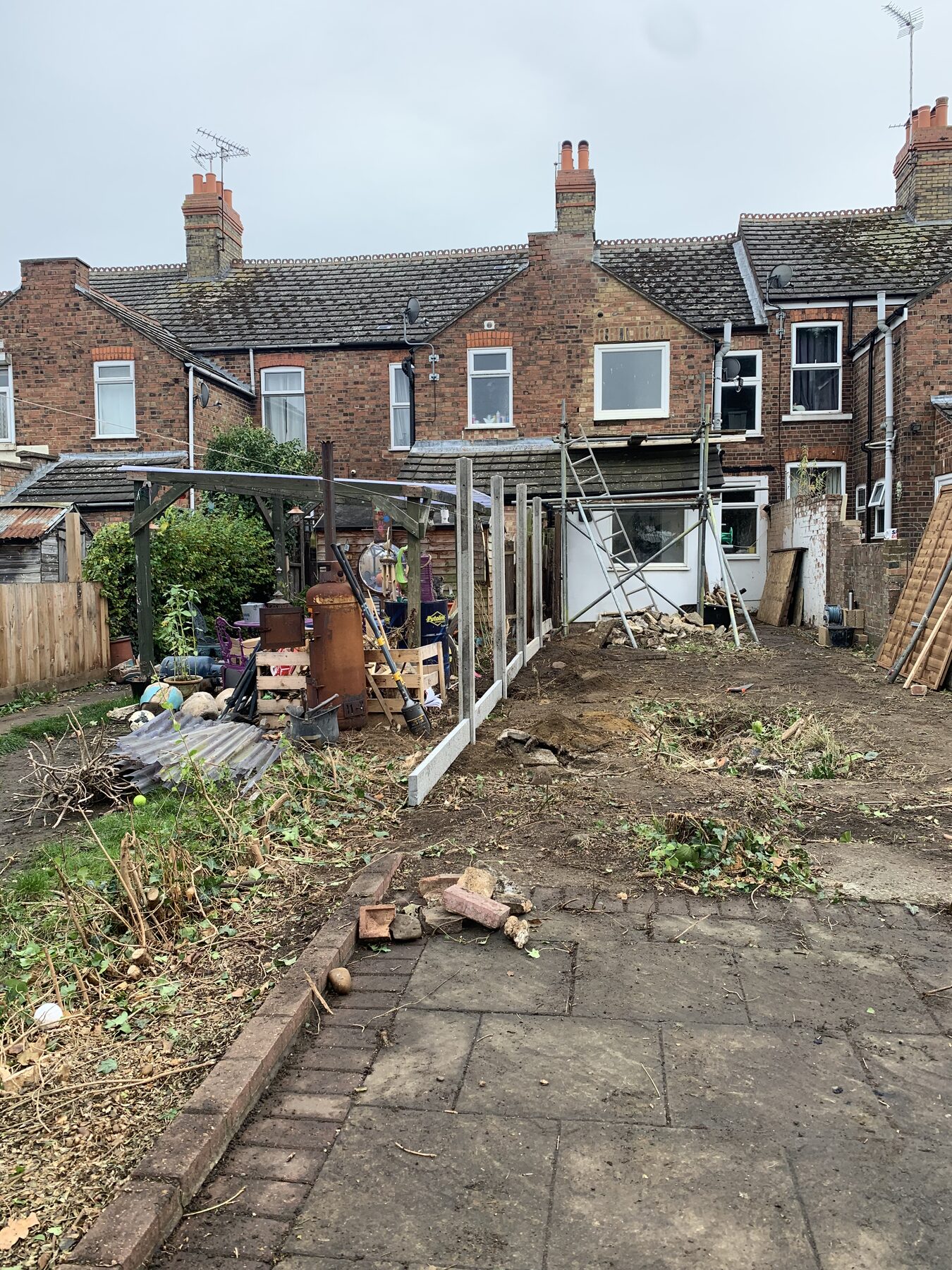 New concrete fence posts installed and garden cleared in Fletton, Peterborough