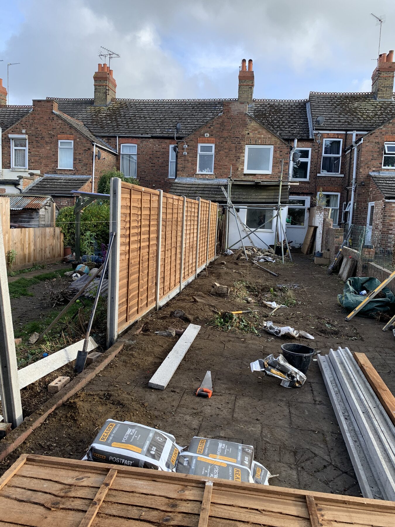 First run of new fence panels going up in Fletton, Peterborough garden