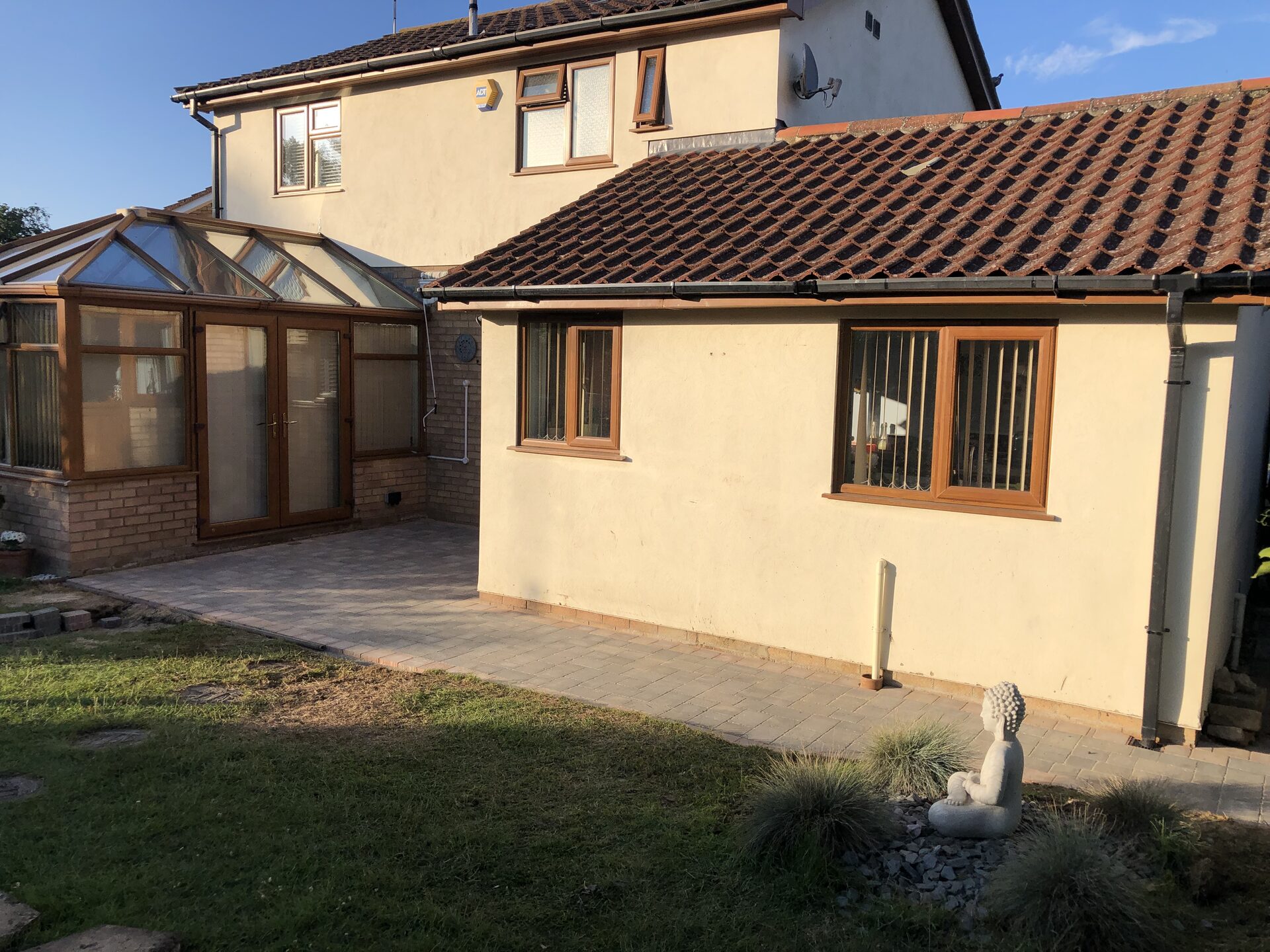 Wider view of completed block-paved patio and pathway in Folksworth, Cambridgeshire
