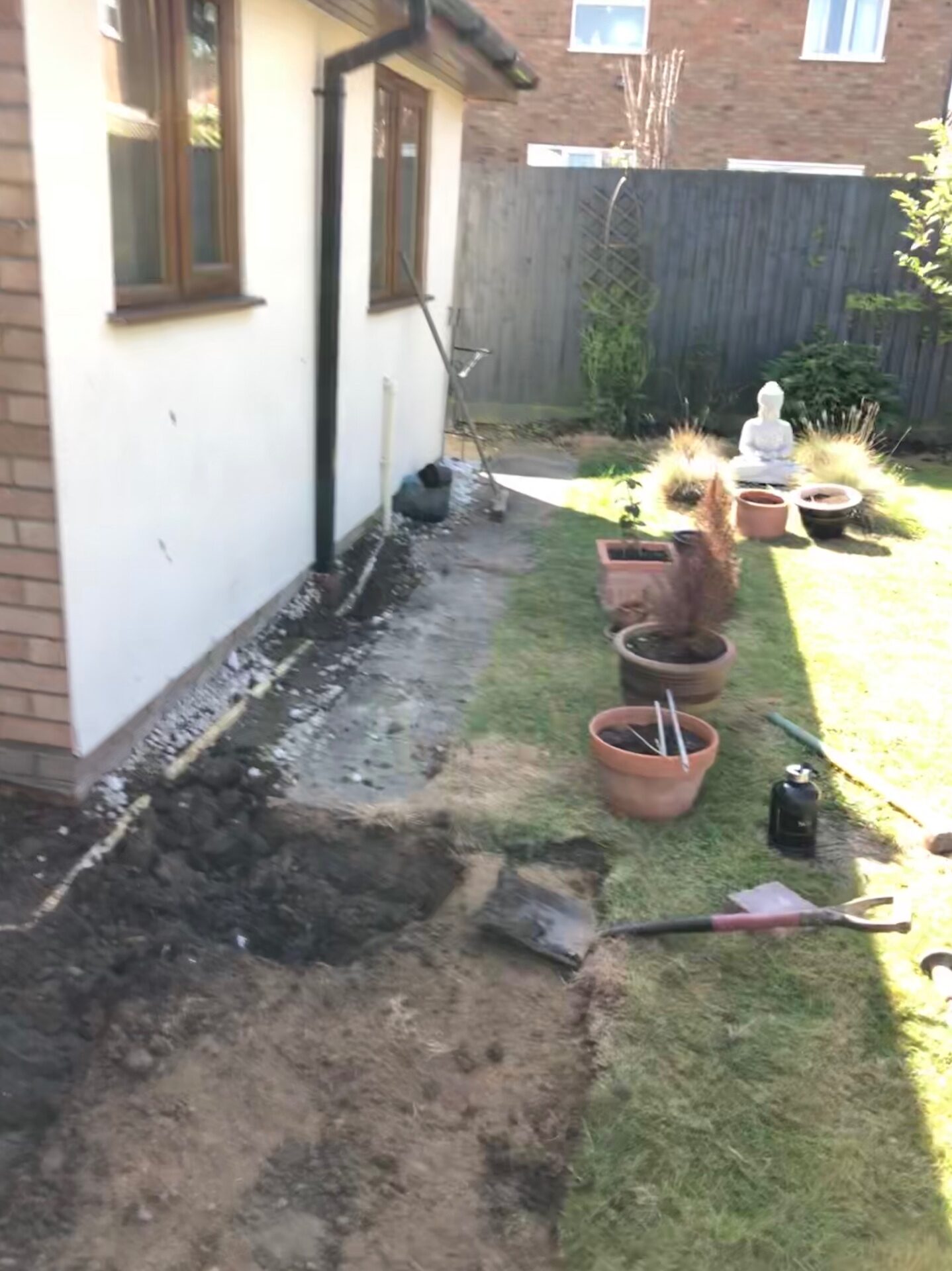 Side return cleared ready for new pathway in Folksworth, Cambridgeshire