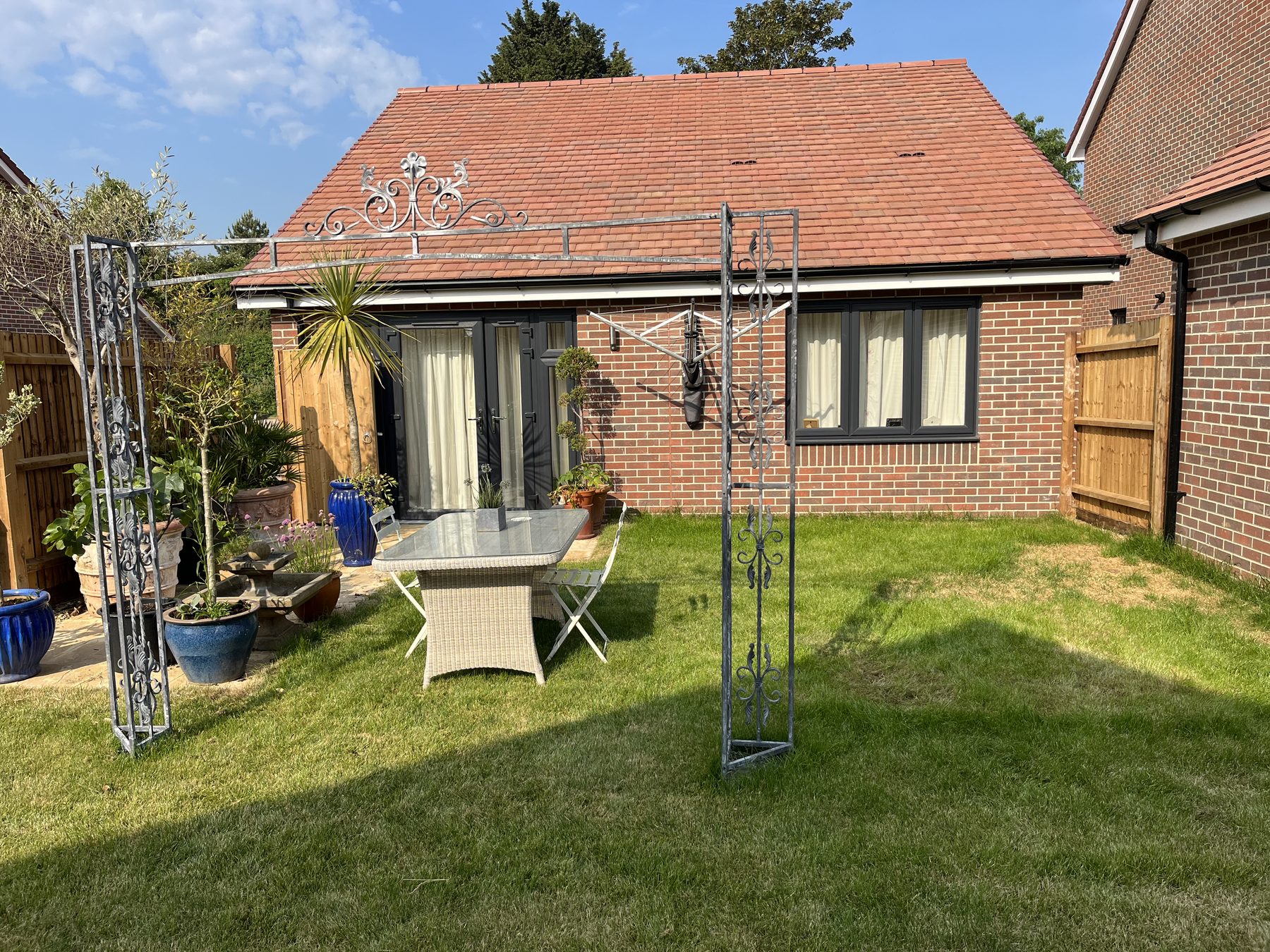 Original garden lawn and borders before transformation in Stilton