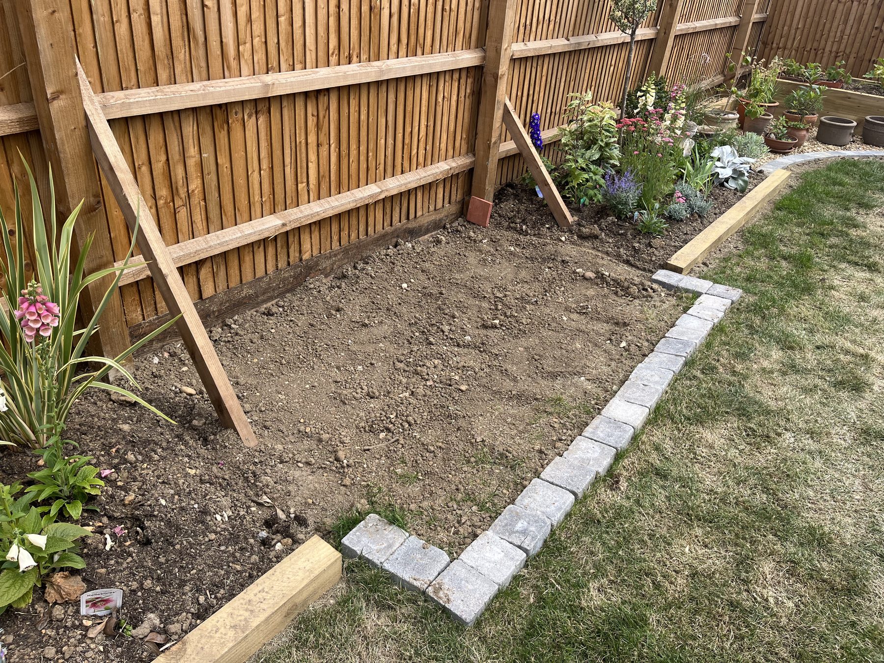 Progress shot of porcelain patio installation in Cambridgeshire